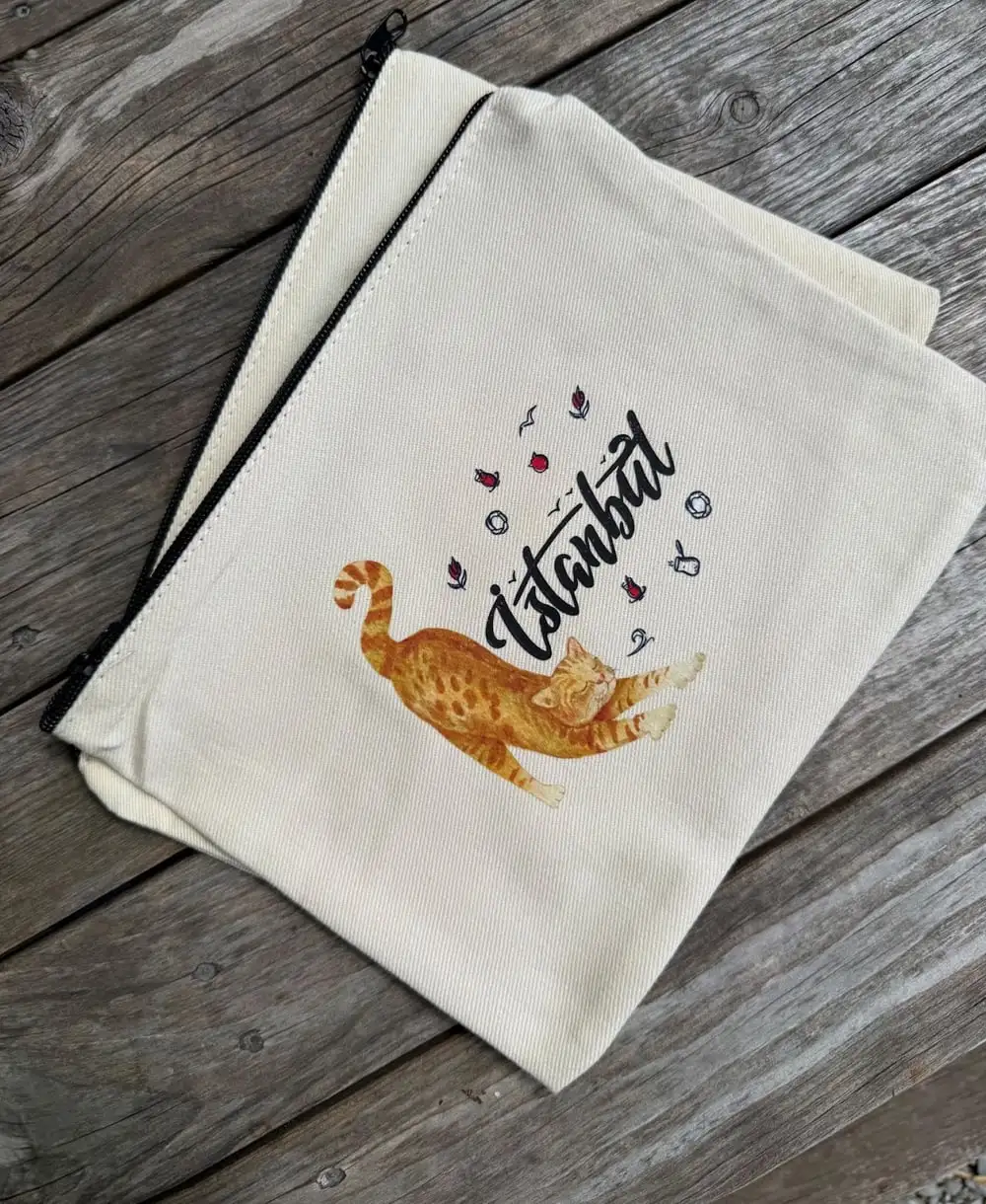 Istanbul Canvas Zipper Pouch: an orange cat beside “İstanbul” in script.