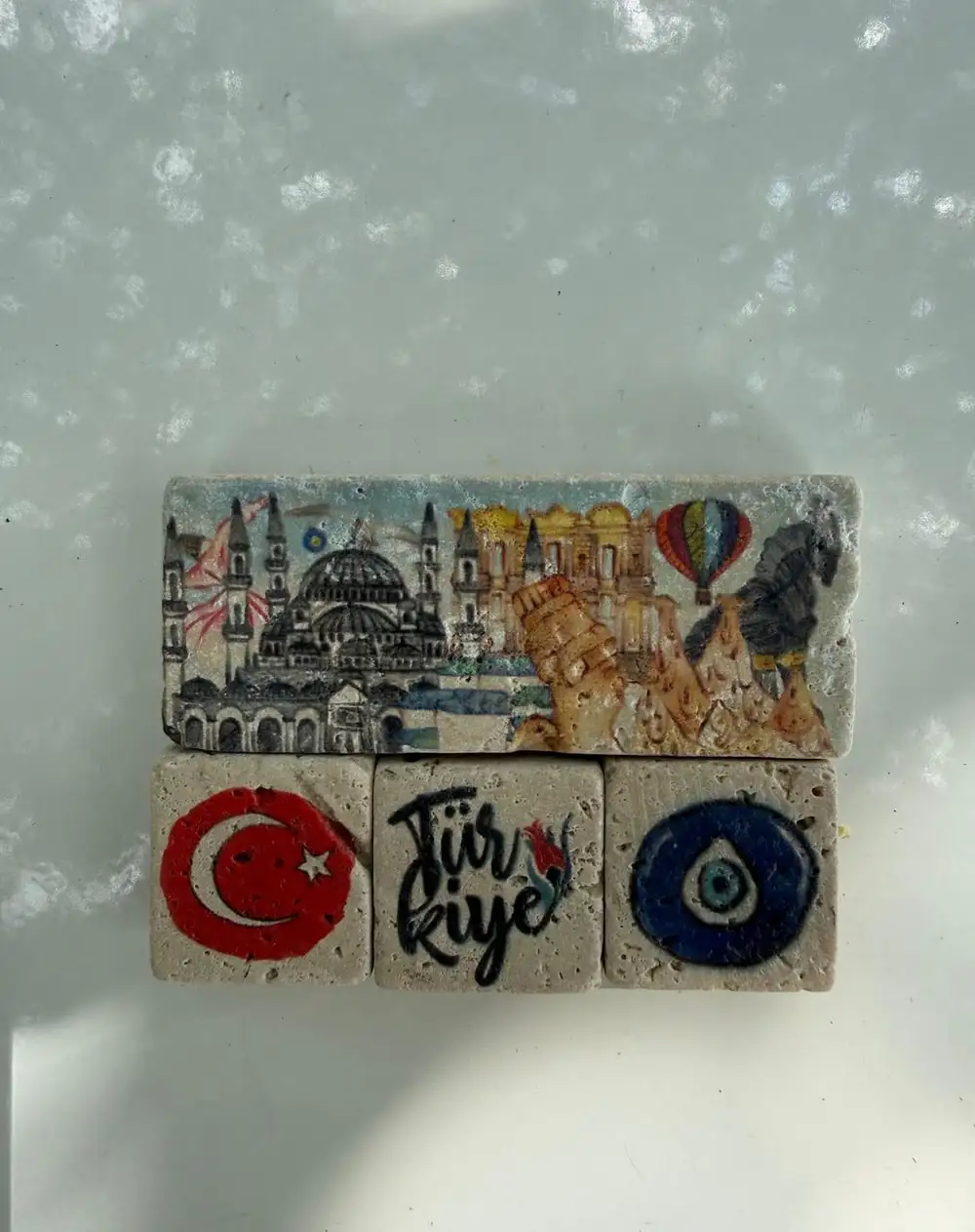 Istanbul Stone Magnets: a skyline with balloons, a flag, “Türkiye” and an evil eye.
