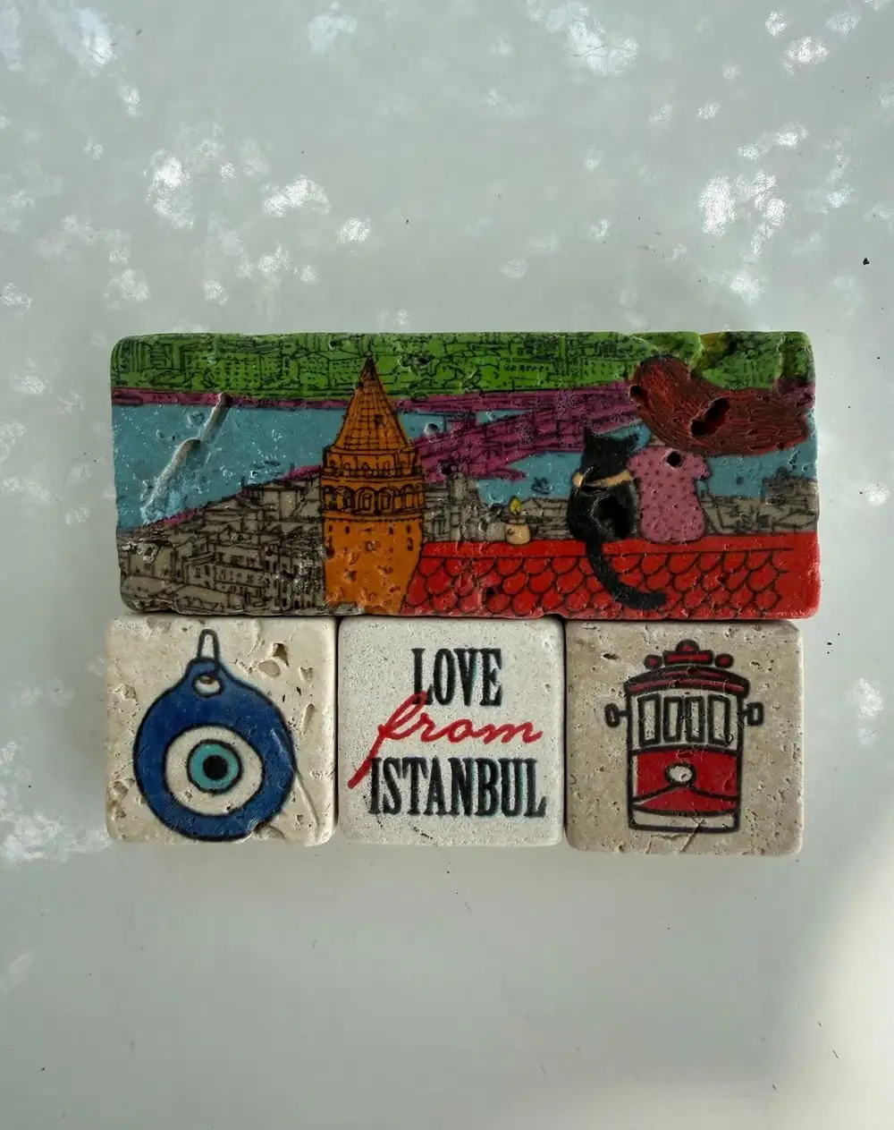 Istanbul Stone Magnets: Galata Tower with cats, an evil eye, “Love from Istanbul” and a tram.