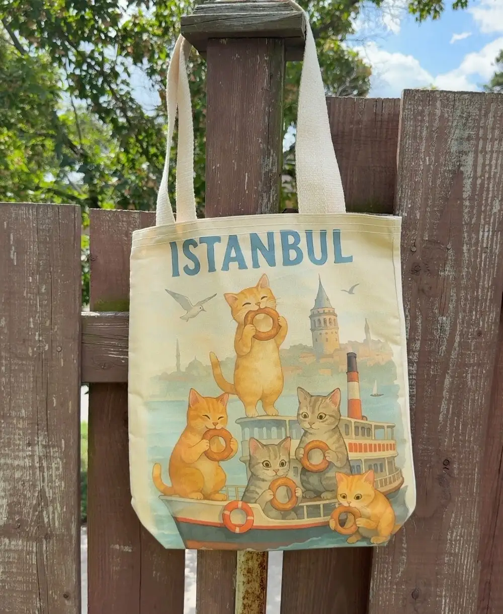 Istanbul Tote Bag: cats watching Galata Tower under an “İstanbul” title.